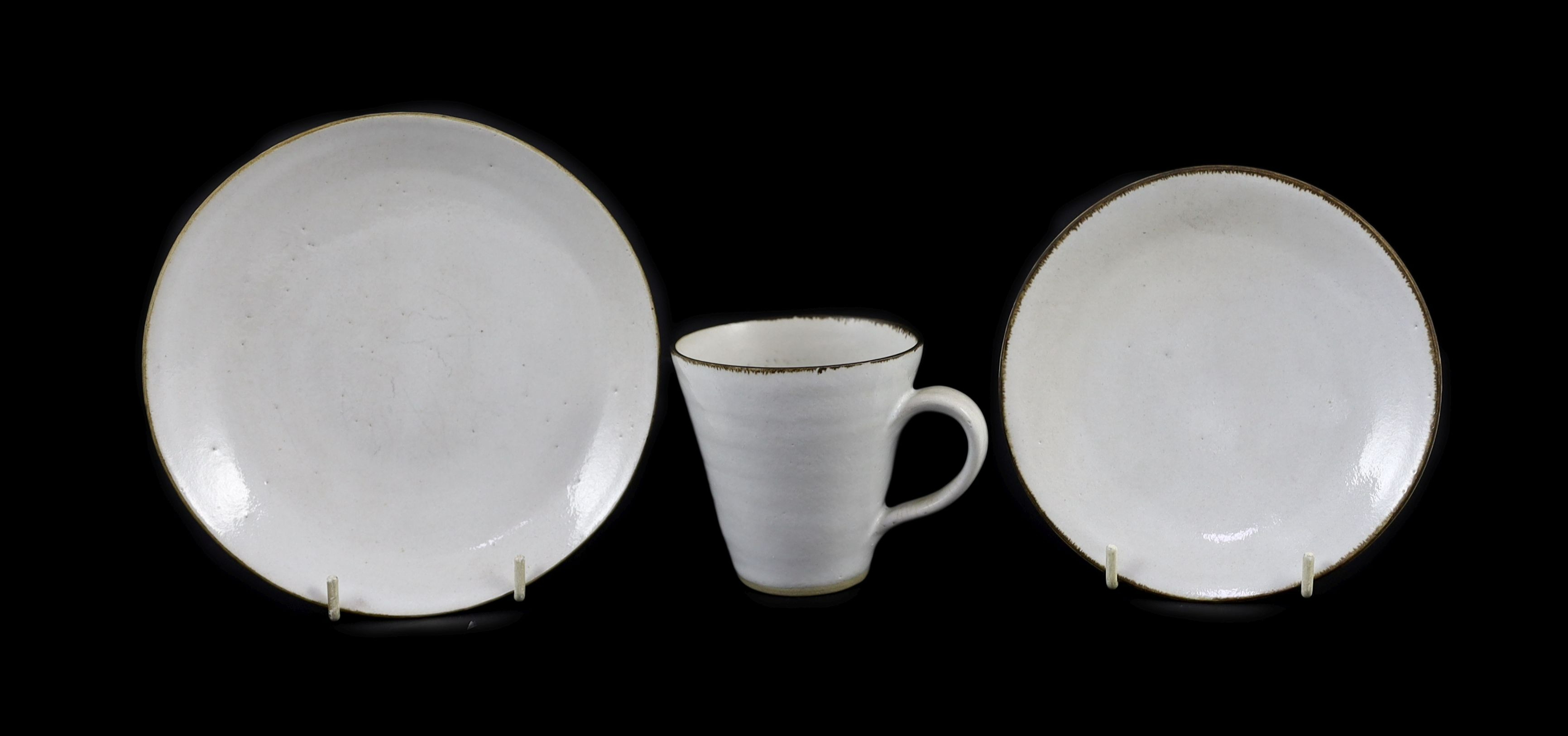 Dame Lucie Rie (1902-1995) a cup, saucer and side plate, c.1959, Cup 8 cm high